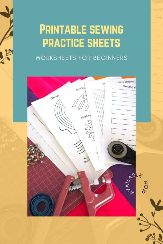 Printable sewing practice sheets on a cutting board with sewing supplies